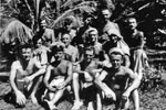 Royal Marine Len Bloomfield is in the back row, second from left, with curly hair