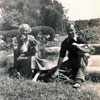 On Mrs. Bullock's farm at Nanyuki near Nairobi, Kenya in June 1955. Keith Butler is holding Mrs. Bullock's parrot. Image from Keith Butler