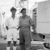 Electrical Artificer Alan Clements with guest on HMS Gambia in Port Said. Photo from Alan Clements.