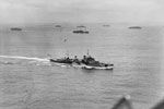 HMS Mauritius escorting a convoy, May 1942. Photo: Lt. H. A. Mason. Imperial War Museum A 10615
