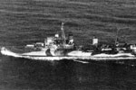 HMS Gambia underway at sea in December 1942
