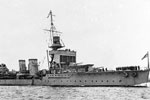 HMS Dragon, a Danae class cruiser, was built in December 1917 and scuttled near France in July 1944. Imperial War Museums Q 75345