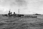 HMS Frobisher escorting a convoy of troop carriers in the Indian Ocean. June 16, 1942. Photo: Lt. F. G. Roper. Imperial War Museums A 10353