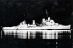 HMS Gambia floodlit sometime between 1950 and 1952. It is thought that Leading Electrical Mechanician Ken "General" Booth arranged the floodlighting