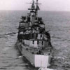 HMS Gambia moving away at speed in 1943