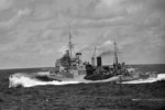 HMS Mauritius at speed during WWII. Imperial War Museums A11657