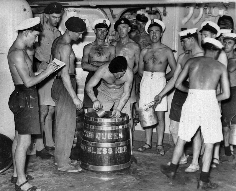 Rum issue in 1952. The rum ration was stopped on July 31, 1970. Photo from my dad's albums.