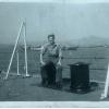 Doug Reynolds with HMS Theseus in the background