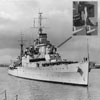 HMS Mauritius of the 1st Cruiser Squadron arrives from the Mediterranean at Chatham Royal Dockyards on Wednesday, September 1, 1948 showing off the Cock of the Fleet (1948) on 'B' turret. They also won the 1946 Mediterranean Regatta. Photo: Antino Biliary
