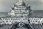 Ship's Company, Palmas Bay, Sardinia. Possibly taken after the Fleet Regatta in September 1954. The ship's Captain was then Walter Evershed. Image from Keith Butler