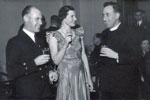 Ship's Dance. Electrical Artificer Alan Clements with Reverencd Bob Pope and wife. Chief Writer Taff Evans in the background. Photo from Alan Clements.