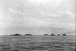 British troop convoy and her escorts. May and June 1942, on board the cruiser HMS Hermione escorting a large British troop convoy to India. The convoy stopped at Freetown on the way. Photo: Lt. S. J. Beadell. Imperial War Museum A 9275