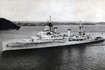 HMS Gambia leaving Trincomalee for home with Paying Off pennant flying, 1956. The length of the Paying Off pennant is traditionally one foot for every year of the ship's service. Photo kindly submitted by Janet Kirkham, niece of sick berth attendant Ken Griffin