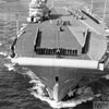 HMS Centaur flagship of Rear Admiral A R Pedder, Flag Officer Aircraft Carriers, leaves Grand Harbour, Malta to take part in flying exercises in the Mediterranean. The ship's company are fallen in on the flight deck and Sea Hawk aircraft of Nos 806 and 803 Squadrons are aligned down the centre of the angled deck. May 1955. Imperial War Museum A 33181