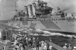 HMS Devonshire passing mail to HMS Mauritius in he Indian Ocean. October 1942. Photo: Lt. H. A. Mason. Imperial War Museums A 13457