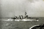 HMS Dragon, a Danae class cruiser, was built in December 1917 and scuttled near France in July 1944. Seen here in 1941 or 1942. Museums Victoria Collections 1717105
