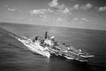 Refuelling at sea. HMS Gambia and HMS Ark Royol or HMS Hermes in the Mediterranean, January 16, 1957. Imperial War Museum A 33717