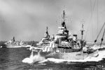 Some of the Mediterranean Fleet who escorted Her Majesty The Queen in HMY Britannia during her passage from Tobruk to Malta in May 1954. They are the cruiser Gambia (nearest camera), the cruiser Bermuda, and the Daring class ship Delight. Imperial War Museum A 32926