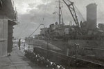 HMS Gambia alongside the Dutch destroyer Van Galen at St Helena, 1942. Photo: Paul van der Moezel. HMS Gambia Association