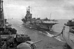 HMS Indomitable being re-oiled. Photo taken from HMNZS Gambia
