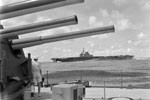 HMS Illustrious from aboard HMS Mauritius, July 1942. Photo: Lt. H. A. Mason. Imperial War Museums A 13451