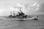 HMS Mauritius at high speed, August 1942. Photo: Lt. H. A. Mason. Imperial War Museums A 11310