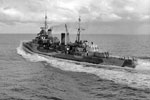 HMS Mauritius at high speed, August 1942. Photo: Lt. H. A. Mason. Imperial War Museums A 11312