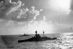 HMS Resolution and HMS Royal Sovereign of the Eastern Fleet sailing in the Indian Ocean during WWII. Photo: Lt. S. C. Oulds. Imperial War Museums A 11791