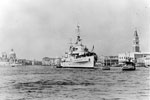 HMS Sheffield anchored in the Canale di San Marco, Venice at the time of the International Film Festival in September 1955. The tower on the right of the ship is the Campanile of St Mark's, and on the left the domed Church of Salute Point (Church of La Lute) can be seen. Imperial War Museums A 33343