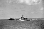 Ships of the Eastern Fleet, HMS Warspite in foreground, HMS Illustrious (left) and in the distance the aircraft carrier HMS Formidable. August 1942. Photo: Lt. H. A. Mason. Imperial War Museums A 13556
