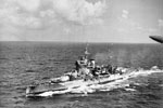 HMS Warspite of the Eastern Fleet and Flagship of Admiral Sir James Sommerville, underway in the Indian Ocean during WWII. Photo: Lt. D. C. Ouids. Imperial War Museums A 11787