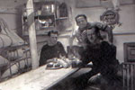 Three of Denys Powell's friends on HMS Gambia one Christmas. Unfortunately I do not know their names or the year. Photo from Denys Powell, kindly submitted by Anita Neads.