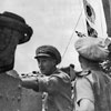The cease fire signal at the yardarm of HMS King George V off the Japanese Coast. Vice Admiral Sir Bernard Rawlings, Flag Officer Commanding the British Task Force, on the bridge in August 1945. Imperial War Museums A 30423