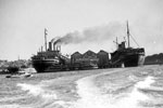 SS Ile de France in Sydney Harbour, New South Wales, Australia on February 14, 1941. On the right is SS Nieuw Amsterdam. Both ships would shortly leave for Malaya. Australian War Memorial 006959