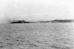 The bombardment of Sabang during Operation Crimson, July 25, 1944 from the destroyer HMS Quilliam. Battleships, cruisers and destroyers of the eastern fleet, supported by carrier-borne aircraft, bombarded Sabang, the Japanese held naval base at the entrance to the Straits of Malacca. The harbour installations were almost completely destroyed. Photo Lt. C. Trusler. Imperial War Museums A 25106