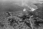 Bombs bursting round Japanese shipping sheltering in Hirara Bay on Mikado Island during the attacks by Avenger bombers of the British Pacific Fleet Task Force on the Sakishima Islands in May 1945. Imperial War Museums A 29193