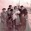 Christening of Brain Clements before leaving Guzz (Devonport Yard, Plymouth), 1950. C.E.A. Don Marr, Bob Hope, E.A. Clements. Photo from Alan Clements.