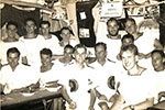 Christmas 1955. Middle Row: Second from left is Telegraphist W. 'Jock' Menzies. Extreme right is 'Oggie' Brown. In front of 'Oggie' Brown and nearest to camera is Leading Telegraphist Jock Aire. Image from Amanda Dalton, John Aire's daughter
