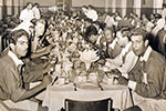 An after match dinner with a local team in Kuwait. John Aire is on the left looking at the camera. Image from Amanda Dalton, John Aire's daughter