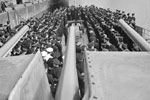 Mr Jordan, High Commissioner of New Zealand, attending the formal handing over of HMS Gambia in Liverpool, October 3, 1943. This is a general view, looking aft, of the handing over ceremony. Photo: Lt. C. H. Parnall. Imperial War Museums A 19581