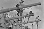 HMS Mauritius: Cleaning the 6" guns, 1942